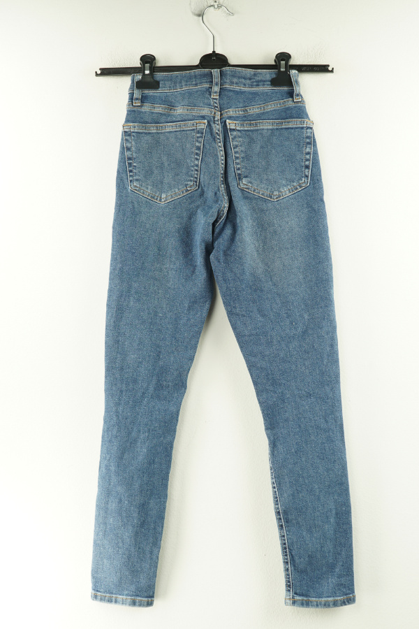 Spodnie niebieskie jeansowe z dziurami na kolanach - TOPSHOP zdjęcie 2