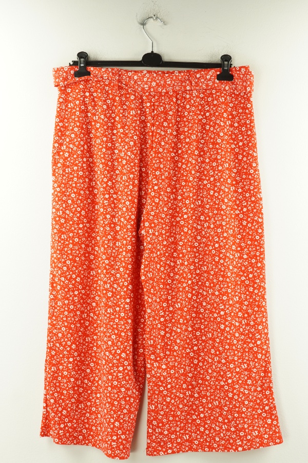Spodnie materiałowe czerwone w białe kwiatki - TU zdjęcie 2