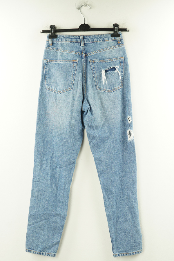 Spodnie niebieskie jeansowe z dziurami i przetarciami - TOPSHOP zdjęcie 2