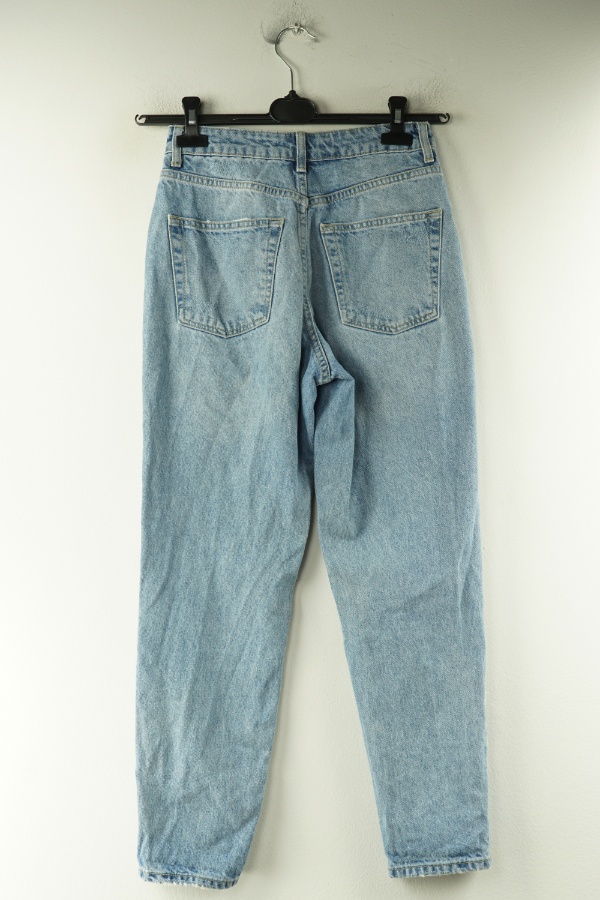 Spodnie niebieskie jeansowe z dziurami i przetarciami - TOPSHOP zdjęcie 2