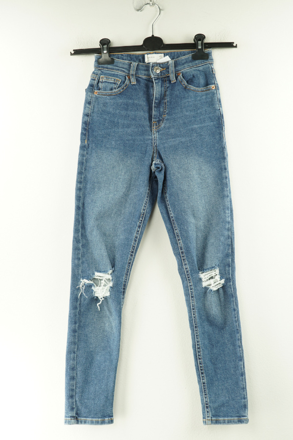 Spodnie niebieskie jeansowe z dziurami na kolanach - TOPSHOP zdjęcie 1