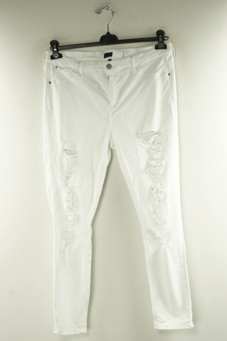 Spodnie białe jeansowe z dziurami