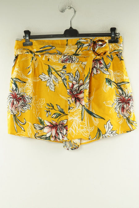 Krótkie spodenki materiałowe żółte kwieciste