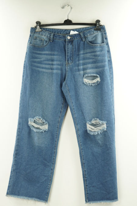 Spodnie niebieskie jeansowe z szerokimi nogawkami i z dziurami